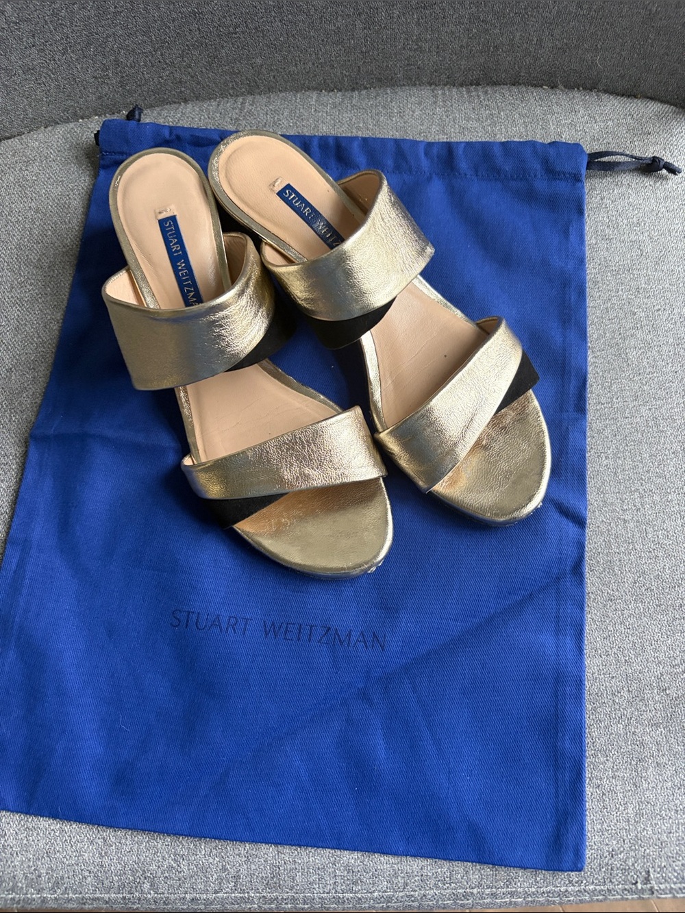Stuart Weitzman Metallic Gold and Black Double-Band Mules